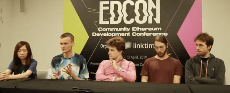 Virgil Griffith, next to Vitalik Buterin and Danny Ryan