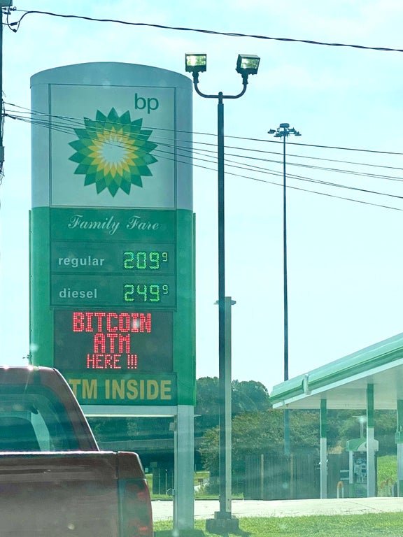 A BP gas station advertises a bitcoin ATM, August 2020
