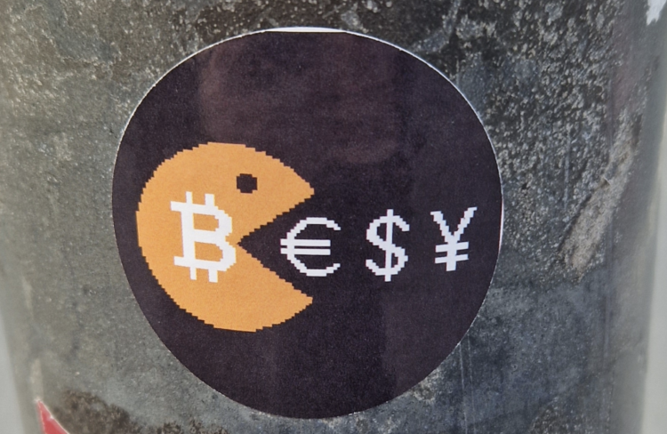 Bitcoin eating fiat sticker, Jan 2023