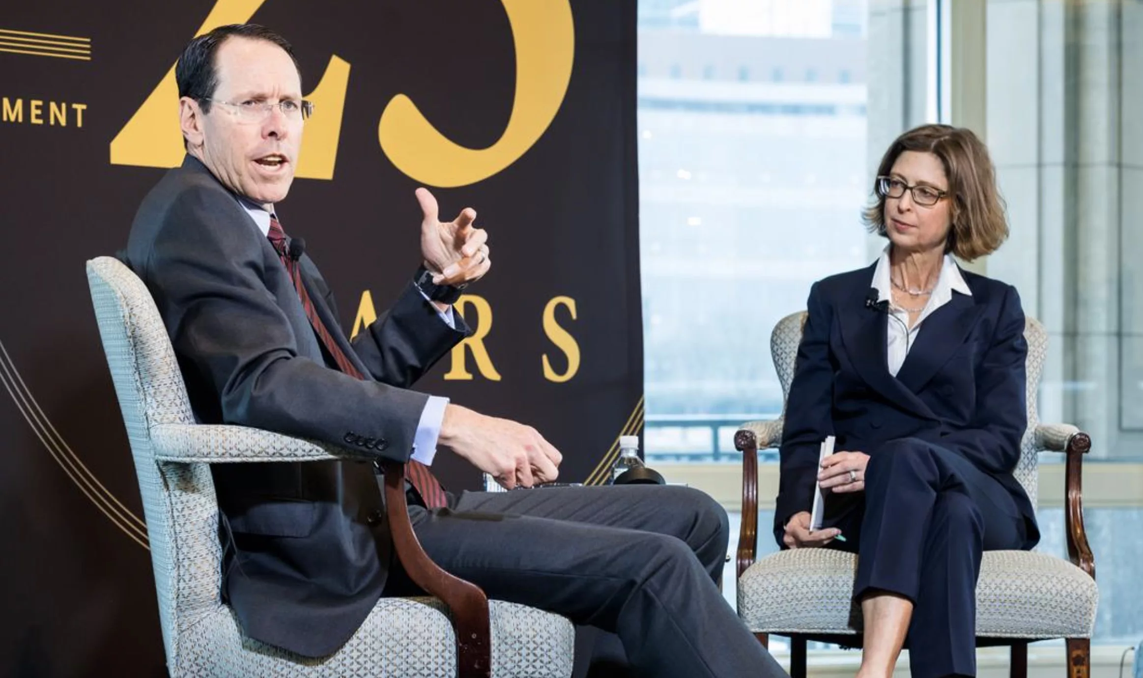 Fidelity's CEO Abigail Johnson on the right, probably wondering: should we break this 69 or wait for Monday?